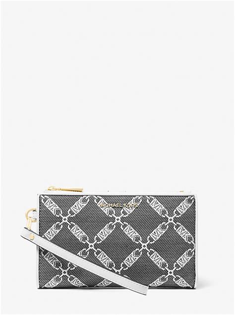 michael kors jet set wristlet white|Jet Set Large Empire Logo Jacquard Wristlet .